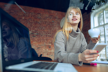 Image showing Beautiful caucasian business lady working in office with laptop