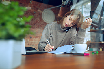 Image showing Beautiful caucasian business lady working in office with laptop