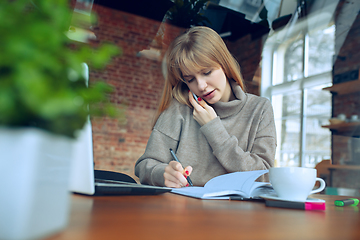 Image showing Beautiful caucasian business lady working in office with laptop