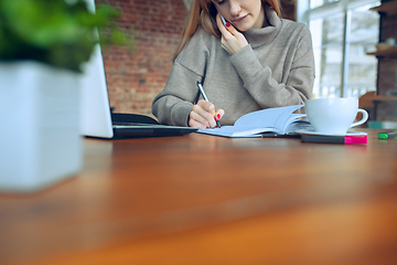 Image showing Beautiful caucasian business lady working in office with laptop