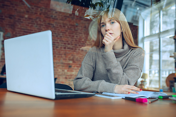 Image showing Beautiful caucasian business lady working in office with laptop