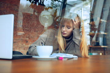 Image showing Beautiful caucasian business lady working in office with laptop