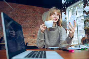 Image showing Beautiful caucasian business lady working in office with laptop