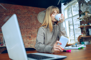 Image showing Beautiful caucasian business lady working in office with laptop