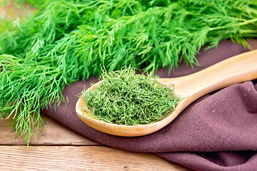 Image showing Dill dry in spoon on board