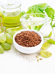 Image showing Flour grape seed in bowl on white board