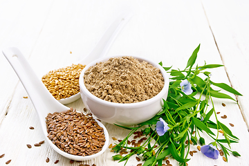 Image showing Flour linen in bowl with seeds on light wooden board