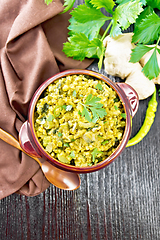 Image showing Kitchari in bowl on black board top