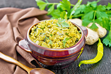 Image showing Kitchari in bowl on dark board