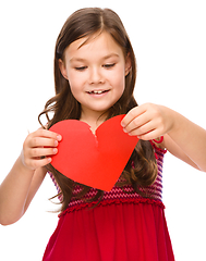 Image showing Portrait of a happy little girl in red