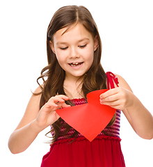 Image showing Portrait of a happy little girl in red