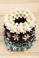 Image showing woman bracelet on wooden background