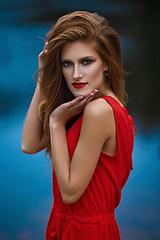 Image showing beautiful girl wiith red lips near lake