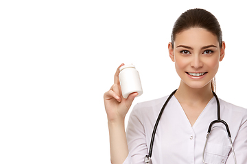 Image showing woman doctor with pills isolated on white