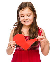 Image showing Portrait of a happy little girl in red