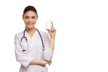 Image showing woman doctor with pills isolated on white