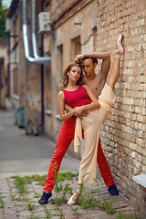 Image showing beautiful modern ballet couple dancing in summer outdoors