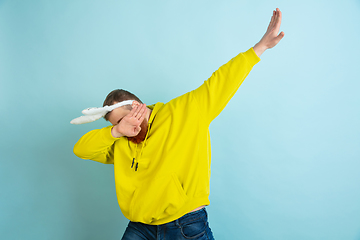 Image showing Easter bunny man with bright emotions on blue studio background