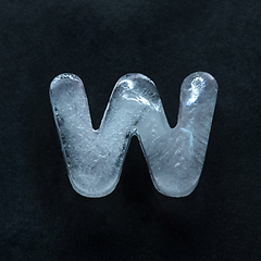 Image showing Alphabet\'s letters made out of ice isolated on dark studio background