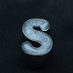 Image showing Alphabet\'s letters made out of ice isolated on dark studio background