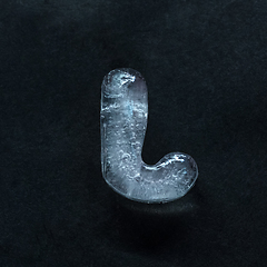 Image showing Alphabet\'s letters made out of ice isolated on dark studio background