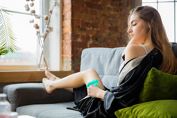 Image showing Beauty Day. Woman doing her daily skincare routine at home