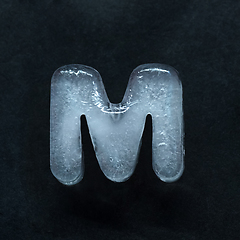 Image showing Alphabet\'s letters made out of ice isolated on dark studio background