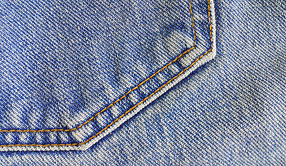 Image showing Fragment of classic blue fashioned jeans