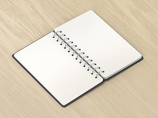 Image showing Blank notebook on wooden desk