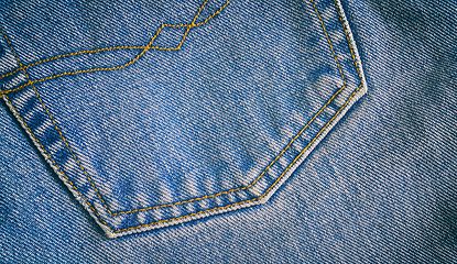 Image showing Fragment of classic blue fashioned jeans