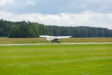 Image showing outdoor shot of small plane taking off