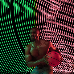 Image showing Creative sport and neon waves on dark neon lighted line background