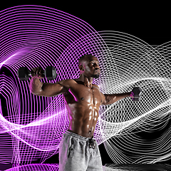 Image showing Creative sport and neon waves on dark neon lighted line background