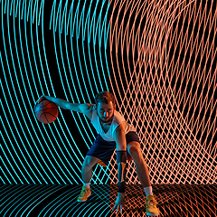 Image showing Creative sport and neon waves on dark neon lighted line background