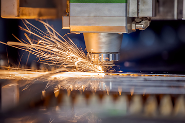 Image showing CNC Laser cutting of metal, modern industrial technology.