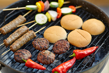 Image showing barbecue kebab meat and vegetables on grill