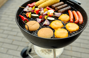 Image showing barbecue kebab meat and vegetables on grill