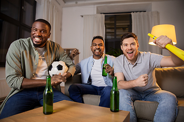 Image showing friends or soccer fans with ball and beer at home