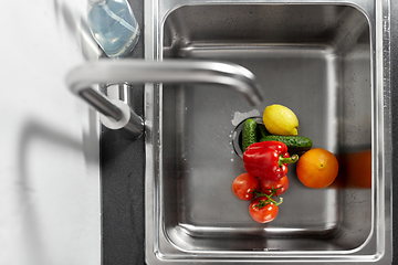 Image showing fruits and vegetables in kitchen sink