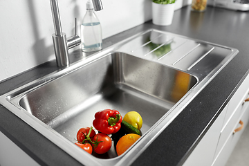 Image showing fruits and vegetables in kitchen sink