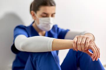 Image showing sad doctor or nurse in protective face mask