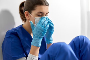 Image showing sad doctor or nurse in protective face mask