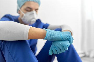 Image showing sad doctor or nurse in protective face mask