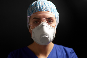 Image showing doctor in goggles and protective face mask