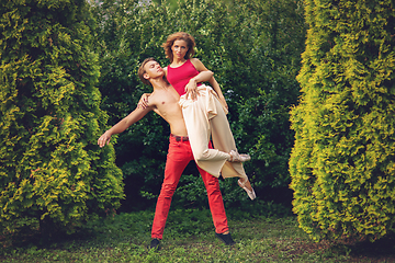 Image showing beautiful modern ballet couple dancing in summer outdoors