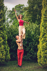 Image showing beautiful modern ballet couple dancing in summer outdoors