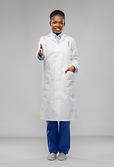 Image showing african american female doctor showing thumbs up