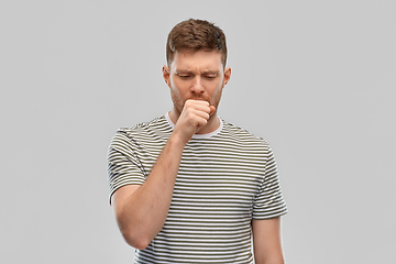 Image showing unhealthy young man coughing