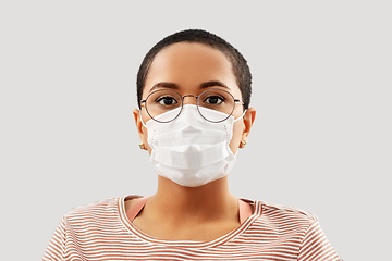 Image showing young african american woman in protective mask