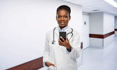 Image showing african american female doctor with smartphone